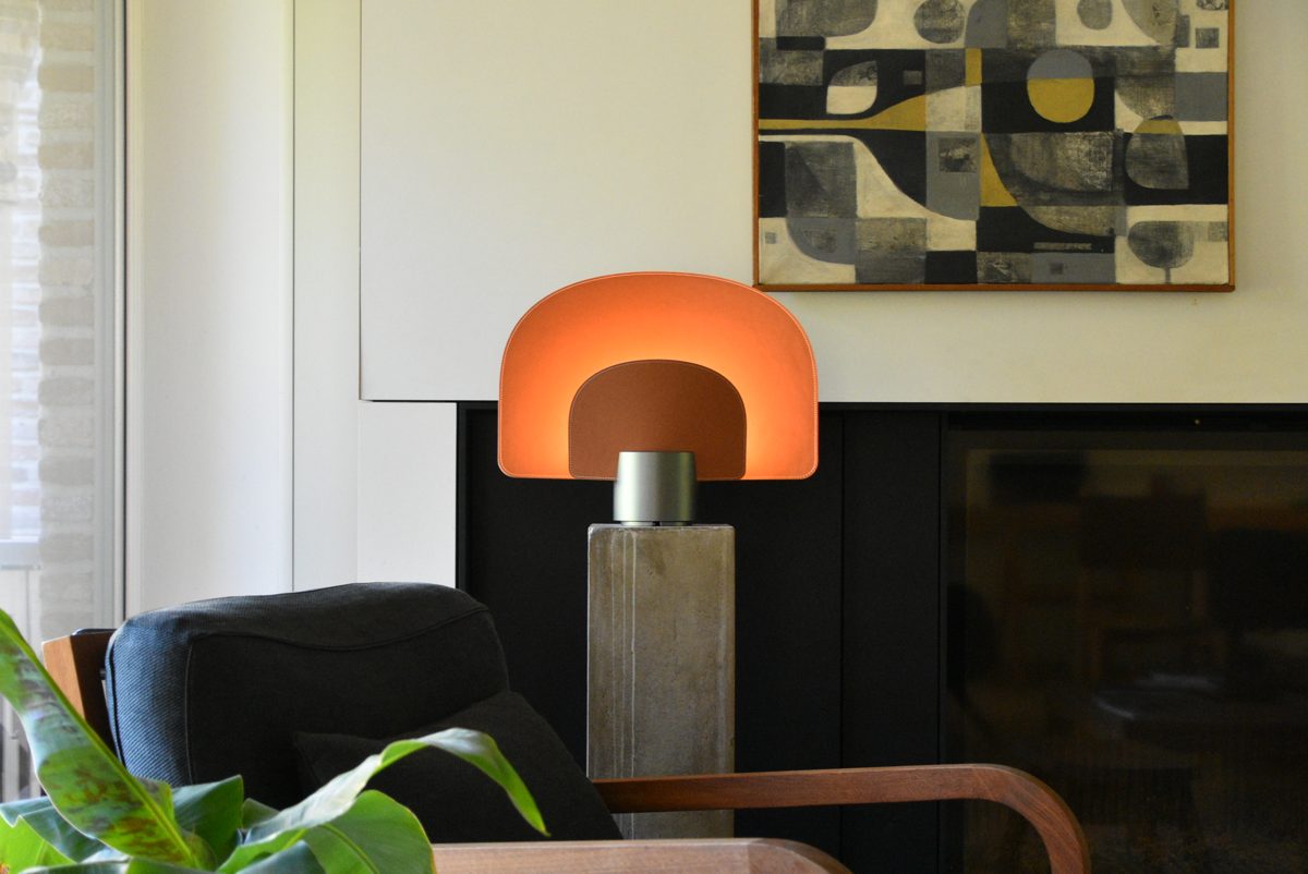 Duocurve leather table lamp with cognac full-grain leather and anodised aluminium base